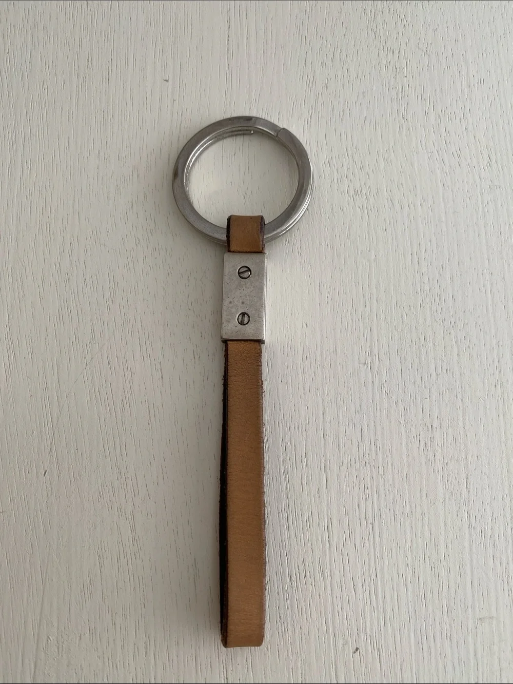 Coach leather strap keychain beige